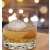 Large round ice ball in a glass of whiskey