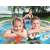 Children playing in Bestway inflatable pool with fruit pattern, 170x53 cm