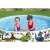 Kids playing in Bestway Dinosaur Kids Pool, 244x46 cm, round, blue, green, white