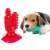 Dog chewing on green cactus dog toothbrush, red cactus dog toothbrush