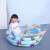 Child playing in Kruzzel inflatable paddling pool, blue with fish and sea life design