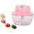 Electric food chopper, pink, with examples of chopped food