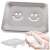 Silver soap dish with smiley face design, showing how to use it