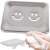 Silver soap dish with smiley face design, showing how to use it
