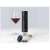 Electric wine opener, black, Gogooda, on table with wine glass