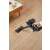 Woman using Dreame R10 Pro cordless stick vacuum cleaner, black, on hardwood floor