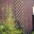 Nature 100x200 cm bamboo trellis, natural color, diamond pattern, for climbing plants, mounted on a brick wall