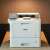 Brother HL-L9430CDN A4 color laser printer on a table, white and gray