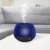 Bewello aroma diffuser with RGB light therapy in use, blue
