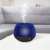 Bewello aroma diffuser with RGB light therapy in use, blue