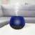 Bewello aroma diffuser with RGB light therapy in use, blue