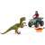 Schleich Velociraptor dinosaur figure attacking a Schleich Ankylosaurus dinosaur figure, a Schleich man figure riding a Schleich quad bike