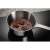 Electrolux LIB60420CK induction hob with a pot of melting chocolate