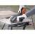 Black & Decker BEG220K-QS angle grinder in use, cutting ceramic tile