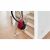 Bosch BGBS2RD1 red bag vacuum cleaner being carried up stairs