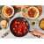 Tefal Early Plus 28cm frying pan, black, non-stick, titanium coating, Thermo-Signal, in use, cooking meatballs in tomato sauce
