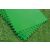 Stack of green pool floor protector mats on grass