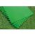 Stack of green pool floor protector mats on grass