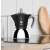 Bialetti Moka Induction 6-cup stovetop espresso maker on a stovetop