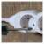 Emos P0521 5-outlet extension cord, 1.5 meters long, white, close-up of socket