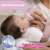 Chicco NaturalFeeling baby bottle being used by a mother to feed her baby, showing the bottle and the baby