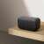 Xiaomi Smart Speaker Lite, black smart speaker, on shelf