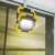 Phenom rechargeable floodlight hanging from a door frame