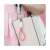 Floveme Keychain Lightning Cable, White with Pink Strap, attached to a handbag