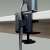 Arctic X1-3D monitor arm, black, showing the clamp that attaches to the desk