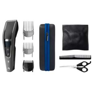 Philips HC7650/15 Series 7000 hair clipper with accessories, including combs, scissors, a cleaning brush, a travel case, and a pouch - Hair clippers