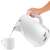 Tefal Loft 1.7L white electric kettle pouring hot water into a cup