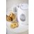 Adler AD1207 white electric kettle with cookies on a table.