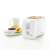 Somogyi Elektronic HGKP01 white toaster with toast, jam, and coffee