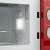 Inside view of Girmi FM21RED red retro microwave oven with grill function