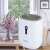 Home by Somogyi DHM 300 dehumidifier, white, in a living room setting