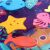 Close up of floating toys inside BabyOno Coral Reef water mat