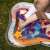 Baby playing on the BabyOno Coral Reef Inflatable Water Play Mat