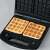 Severin SA2968 3-in-1 Sandwich Maker with interchangeable plates, showing waffles