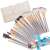24 piece professional makeup brush set with a white case and blue ribbon