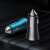 Baseus Golden Contactor Max car chargers in gray and blue on car seat