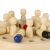 Close-up of Ikonka wooden memory game pegs and dice