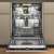 Whirlpool W8I HT58 TS built-in dishwasher, beige, open door, showing interior