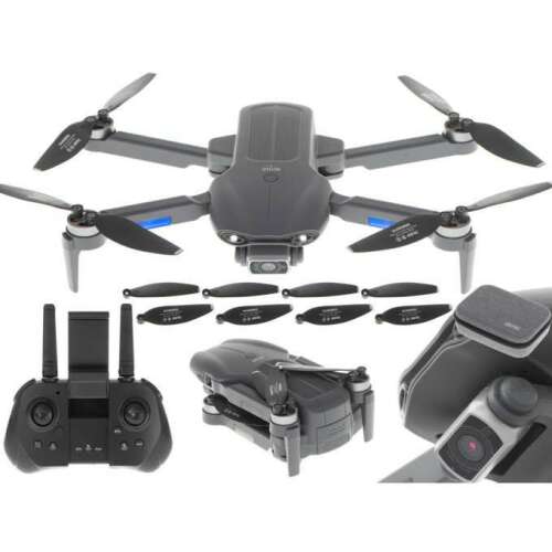 RC F9 drone with camera, remote control, and spare propellers