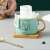 Pufo Reason light green ceramic mug with bamboo coaster and golden spoon, 180 ml, showing how to use the mug with a coffee filter