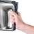 Hand holding the Severin HM3832 hand mixer, showing the comfortable grip