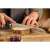 Person using Tefal Ice Force bread knife to cut bread