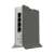 MikroTik hAP ax lite LTE6 router, white and grey, side view