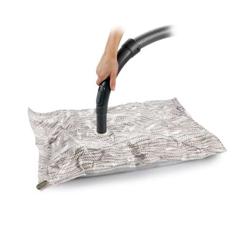 FANCY HOME vacuum bag being used with a vacuum cleaner to remove air