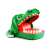 Jocul Dentistul Crocodil, crocodil verde cu gura deschisă și dinți roșii, joc distractiv de familie
