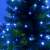 Close-up of blue LED string lights on a Christmas tree